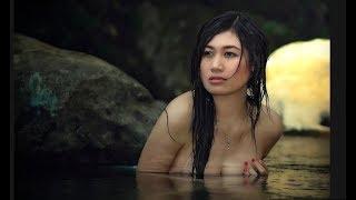 Beautiful Asian women hot bathing in a stream at countryside