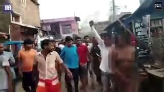 Woman paraded naked by mob over rumours she had killed a man