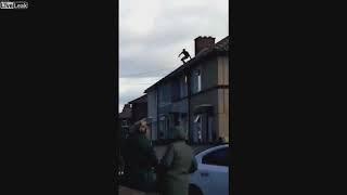 Naked Guy On Roof Throws Tiles At Police