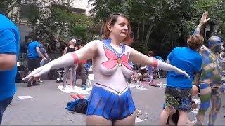 These Nude Women enjoy getting body paint: Sailor Moon, blue boobs and other fantastic designs