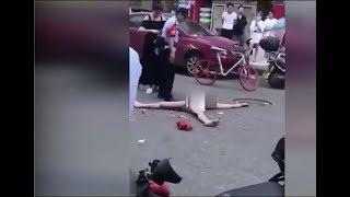 Woman in China Gets Caught Stealing Decides to Strip Naked | China Ratchet Daily