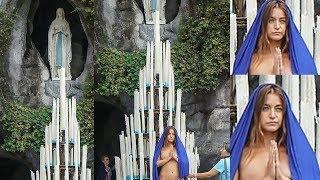 ???? Artist is arrested for stripping NAKED at French Catholic pilgrimage site!
