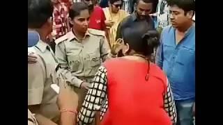 Lady Police beat Women Fighting the Public Place