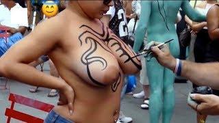 Woman Gets Boobs done in Monochrome Tribal Pattern by Artist at Nude Body Painting Festival
